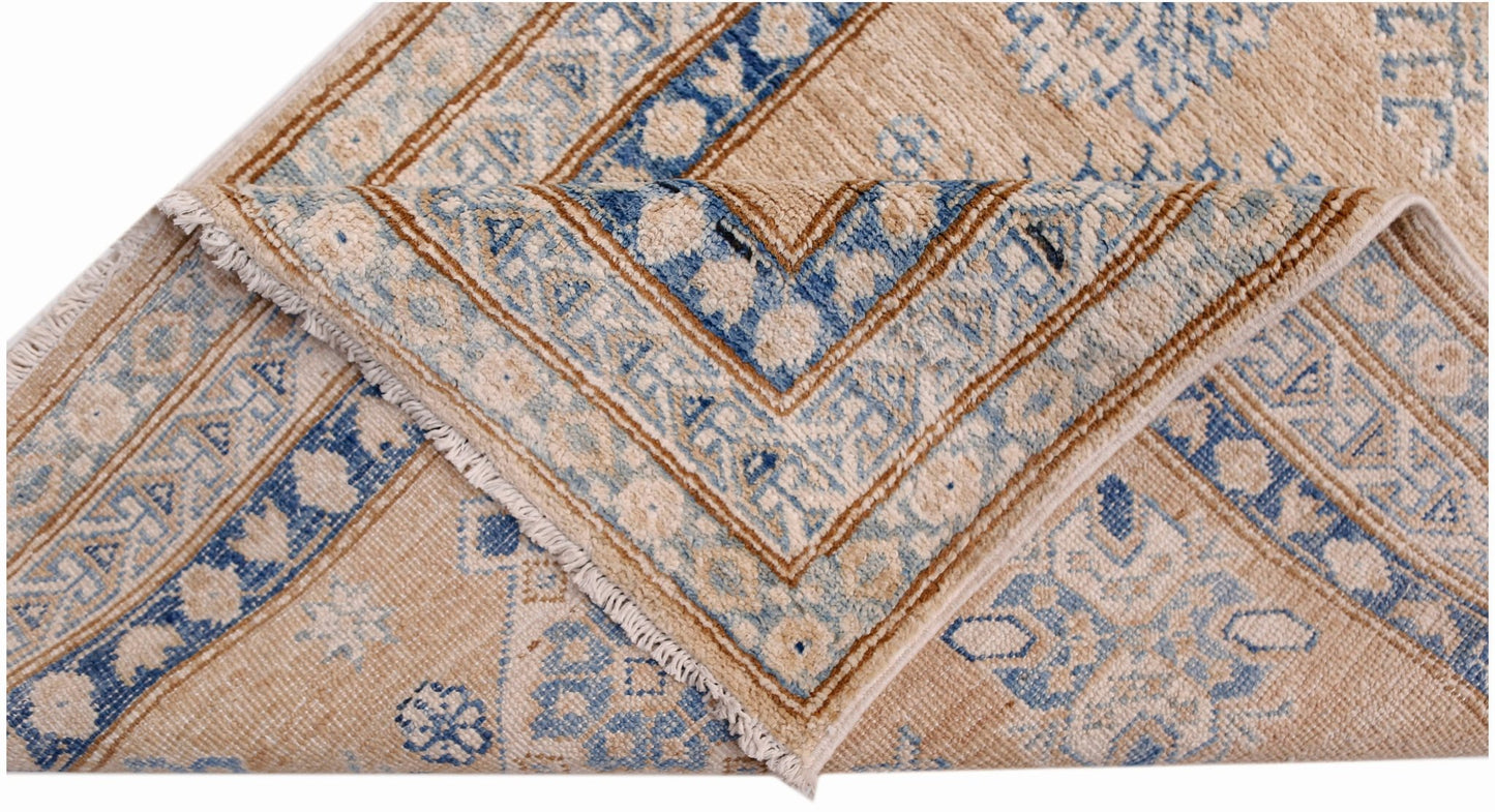 A hand-knotted Afghan Super Kazakh runner featuring traditional blue and beige geometric patterns.