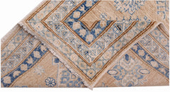 A hand-knotted Afghan Super Kazakh runner featuring traditional blue and beige geometric patterns.