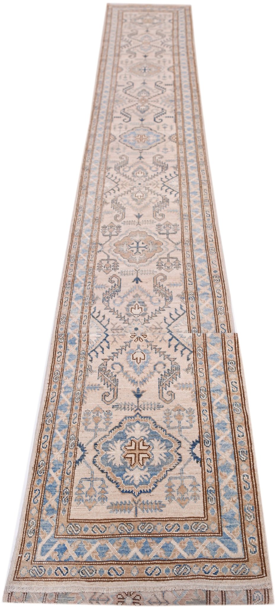 A long, handmade Afghan Super Kazakh runner rug featuring traditional blue and tan geometric motifs.