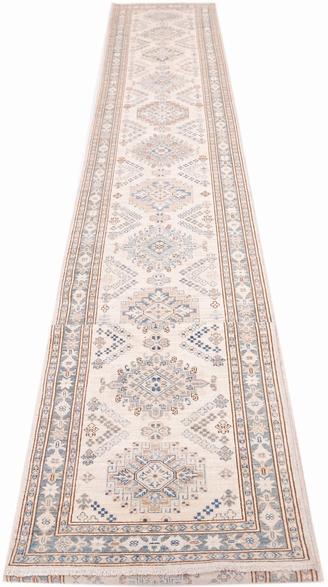 An Afghan Super Kazakh runner rug featuring traditional geometric motifs in blue and beige tones.