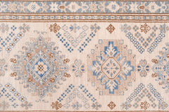 Handmade Afghan Super Kazakh runner featuring traditional geometric motifs in blue and tan.