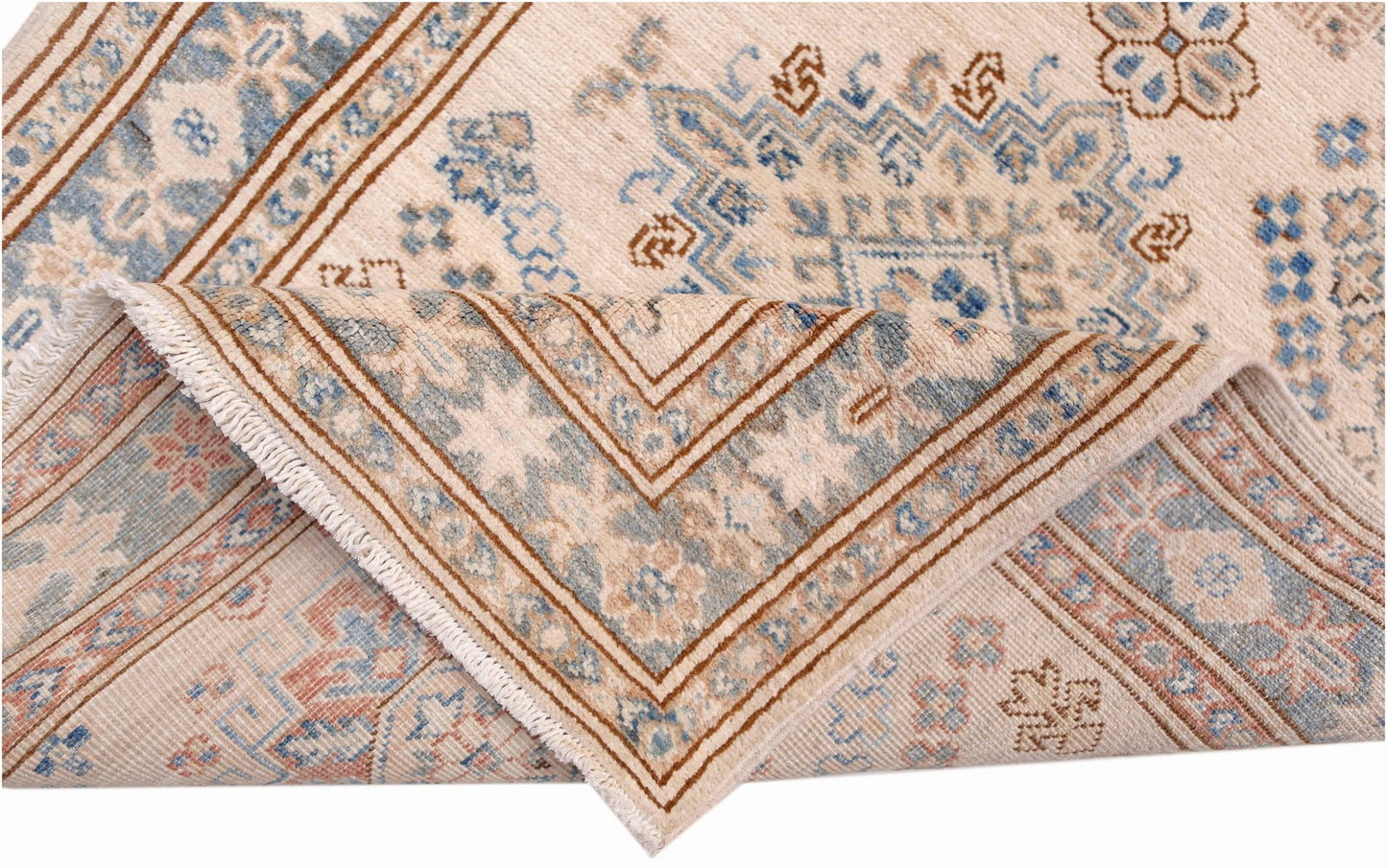 A handmade Afghan Super Kazakh runner featuring traditional geometric motifs in blue and tan.
