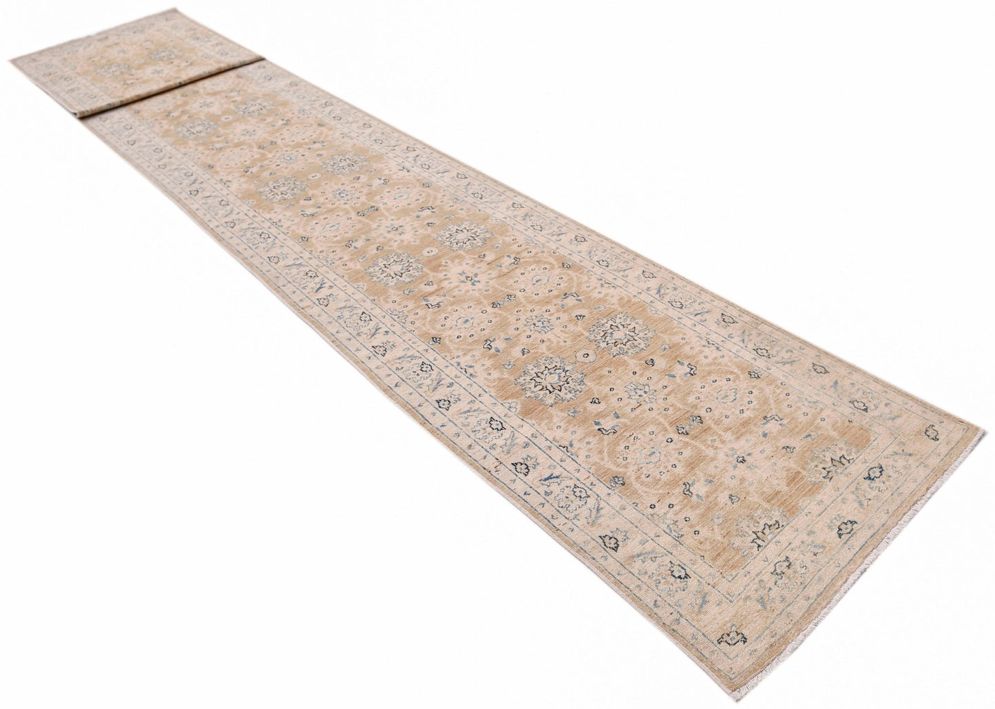 A long, handmade Afghan Super Kazakh runner rug featuring traditional motifs in beige and blue.
