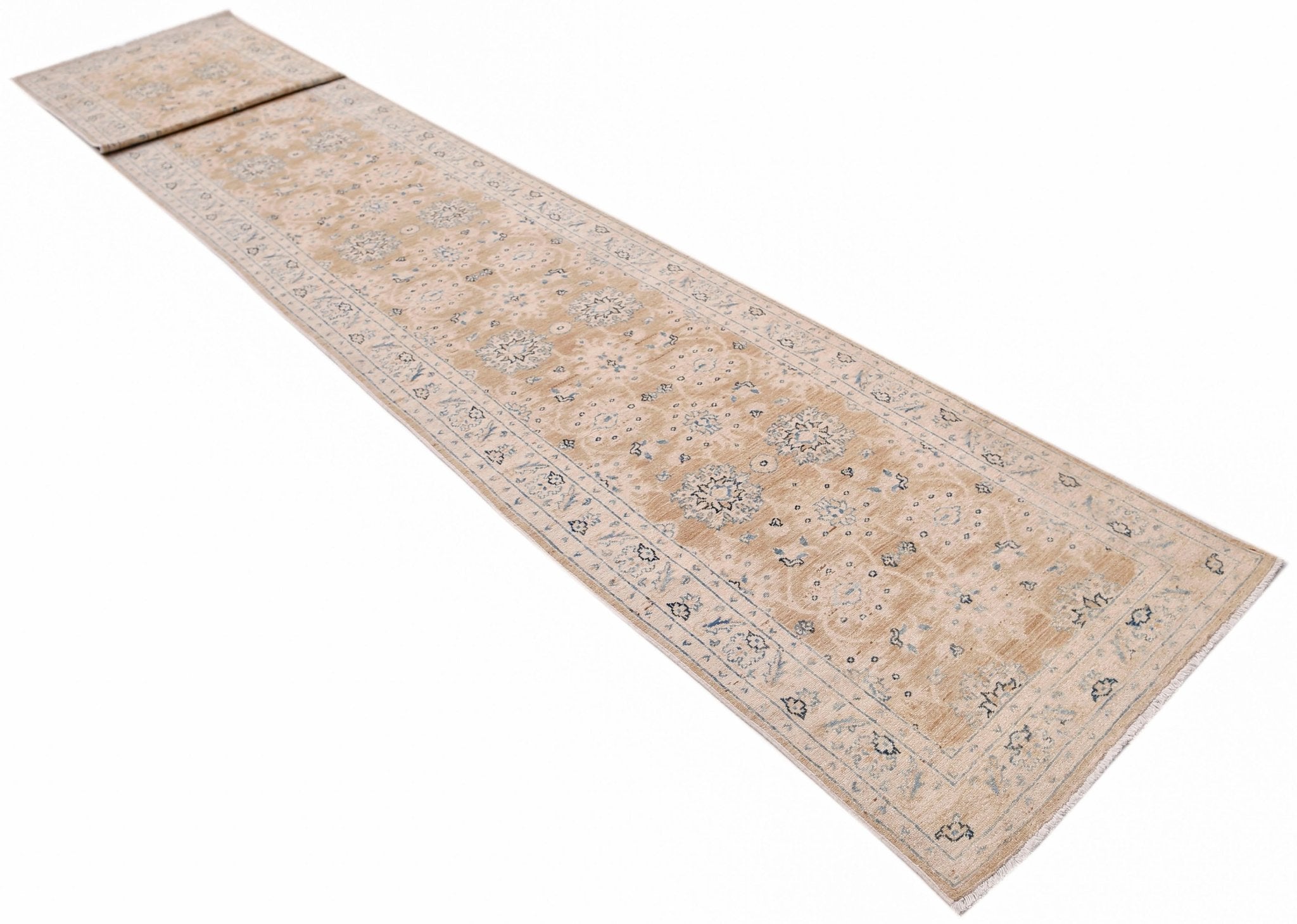 A long, handmade Afghan Super Kazakh runner rug featuring traditional motifs in beige and blue.