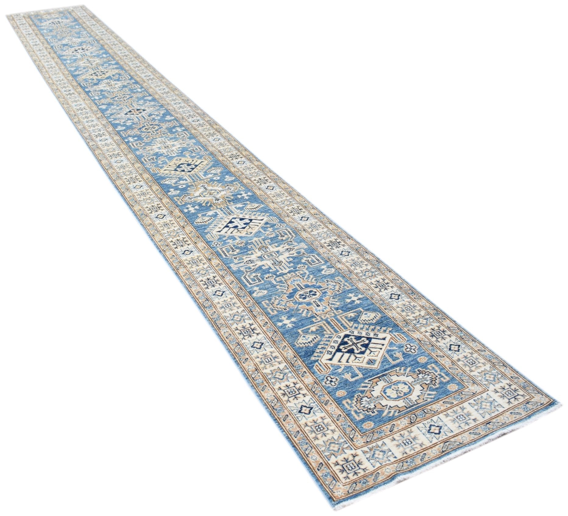 A long, handmade Afghan Super Kazakh runner rug featuring traditional blue and beige geometric motifs.
