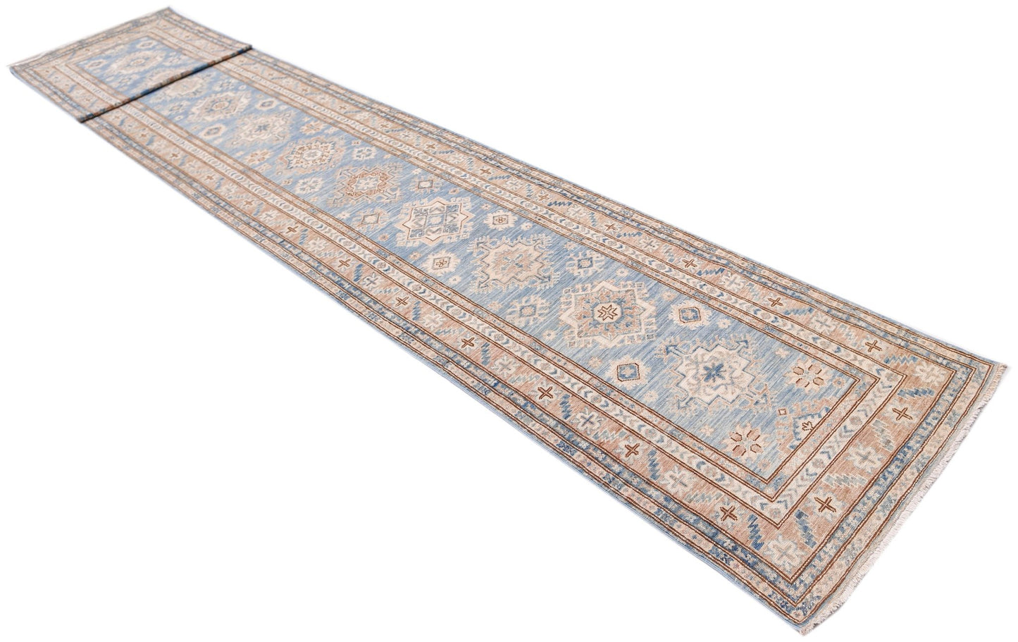 A long, handmade Afghan Super Kazakh runner rug featuring traditional geometric motifs in blue and tan.