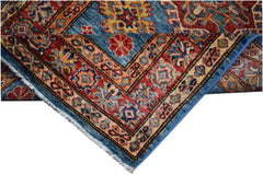 An Afghan Super Kazakh runner rug featuring a blue field with traditional red and gold patterns.