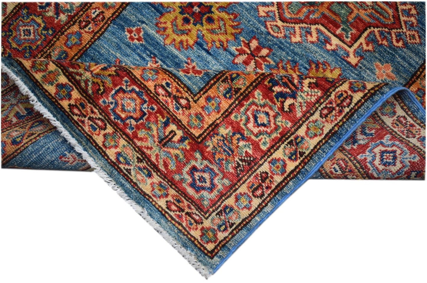 An Afghan Super Kazakh runner featuring a blue field with traditional red and gold geometric motifs.