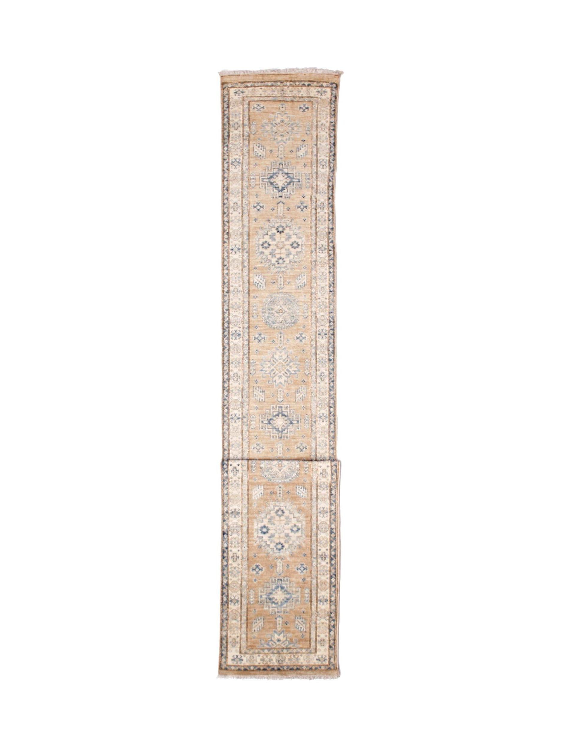 An Afghan Super Kazakh runner rug featuring traditional blue geometric motifs on a tan background.