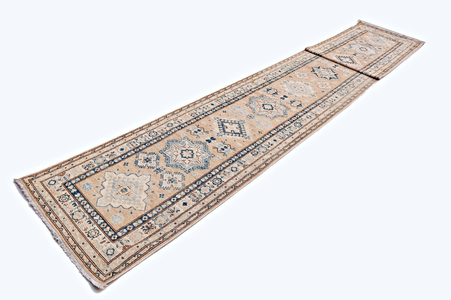 A long, handmade Afghan Super Kazakh runner rug featuring traditional blue and beige geometric motifs.