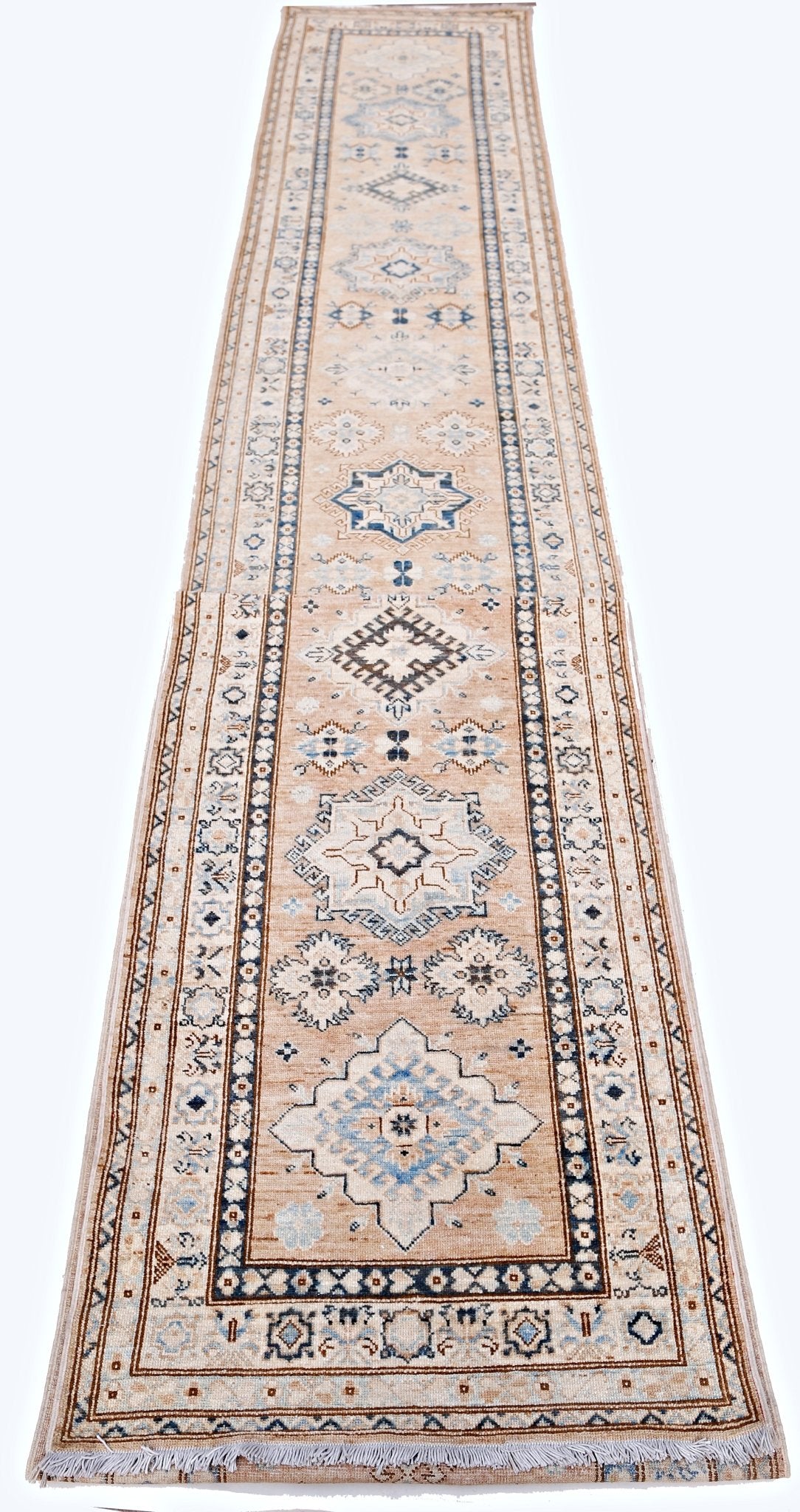 A long, handmade Afghan Super Kazakh runner rug featuring traditional geometric motifs in blue.