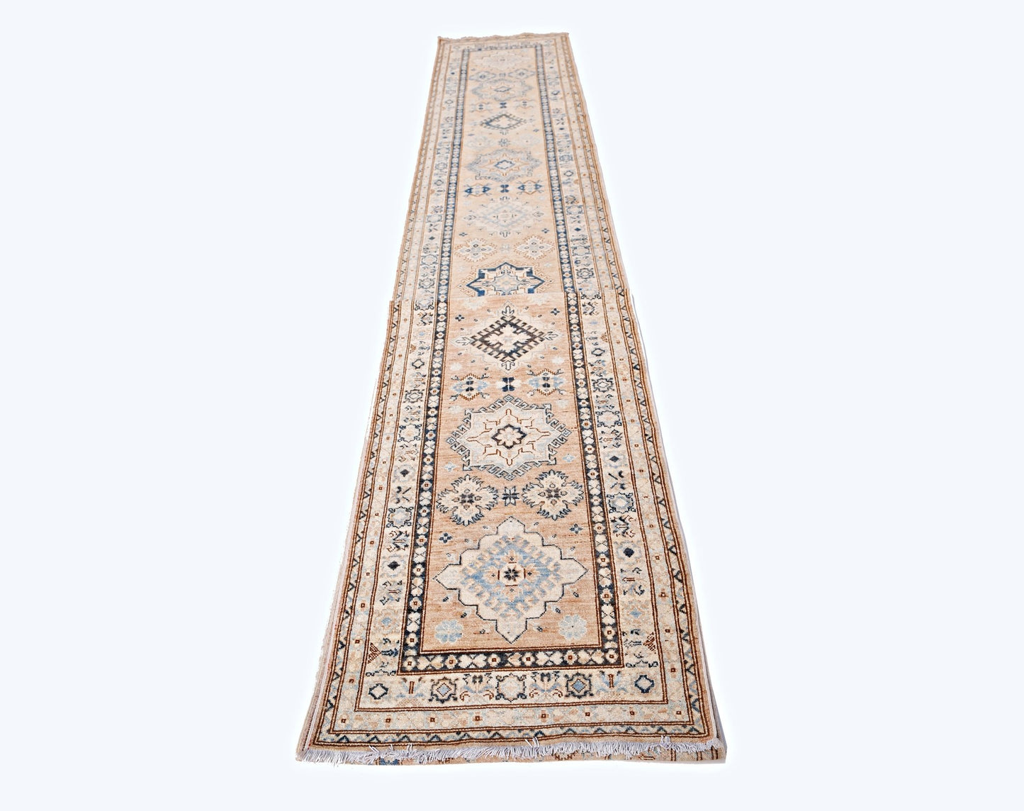 A long, handmade Afghan Super Kazakh runner rug featuring traditional geometric motifs in beige and blue.