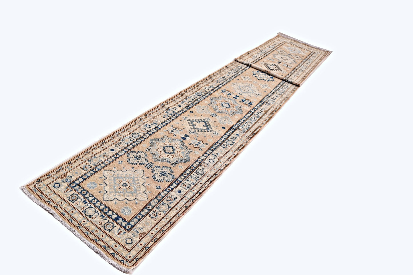 A long, handmade Afghan Super Kazakh runner rug featuring traditional blue and beige geometric motifs.