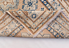 A hand-knotted Afghan Super Kazakh runner featuring traditional blue and beige geometric patterns.