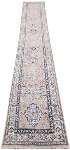 A long, handmade Afghan Super Kazakh runner rug featuring traditional blue and beige geometric motifs.