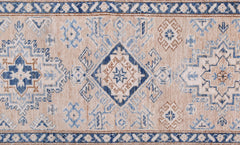 An Afghan Super Kazakh runner featuring traditional geometric motifs in blue and tan wool.