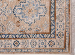 Handmade Afghan Super Kazakh runner featuring traditional blue and brown geometric motifs.