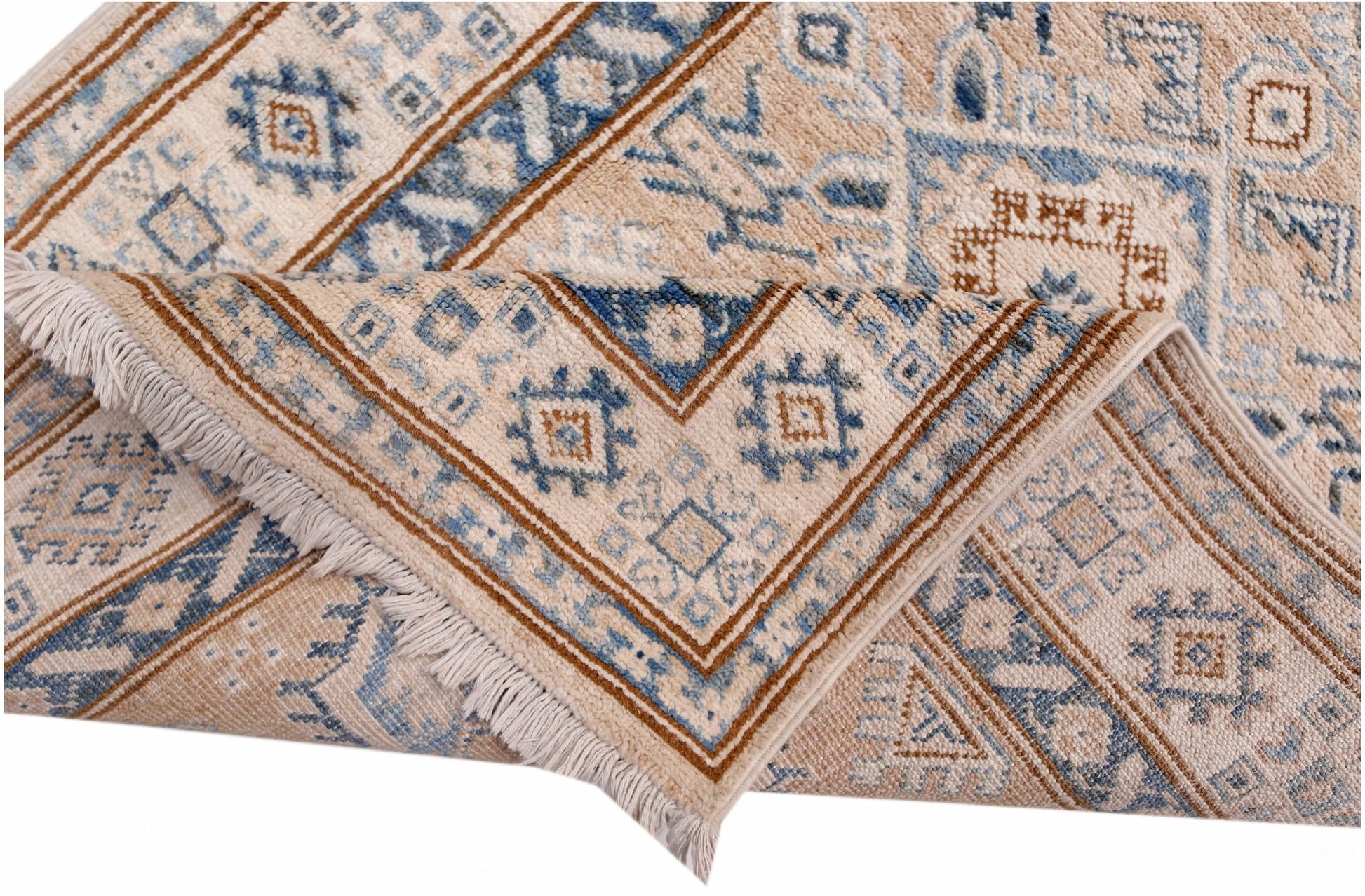 A handmade Afghan Super Kazakh runner featuring traditional blue and brown geometric patterns.