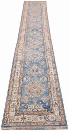 An Afghan Super Kazakh runner rug featuring traditional geometric motifs in blue and beige tones.