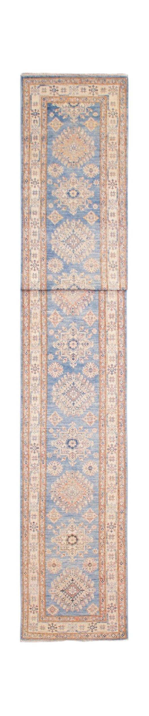 A long, handmade Afghan Super Kazakh runner rug featuring traditional blue and cream motifs.