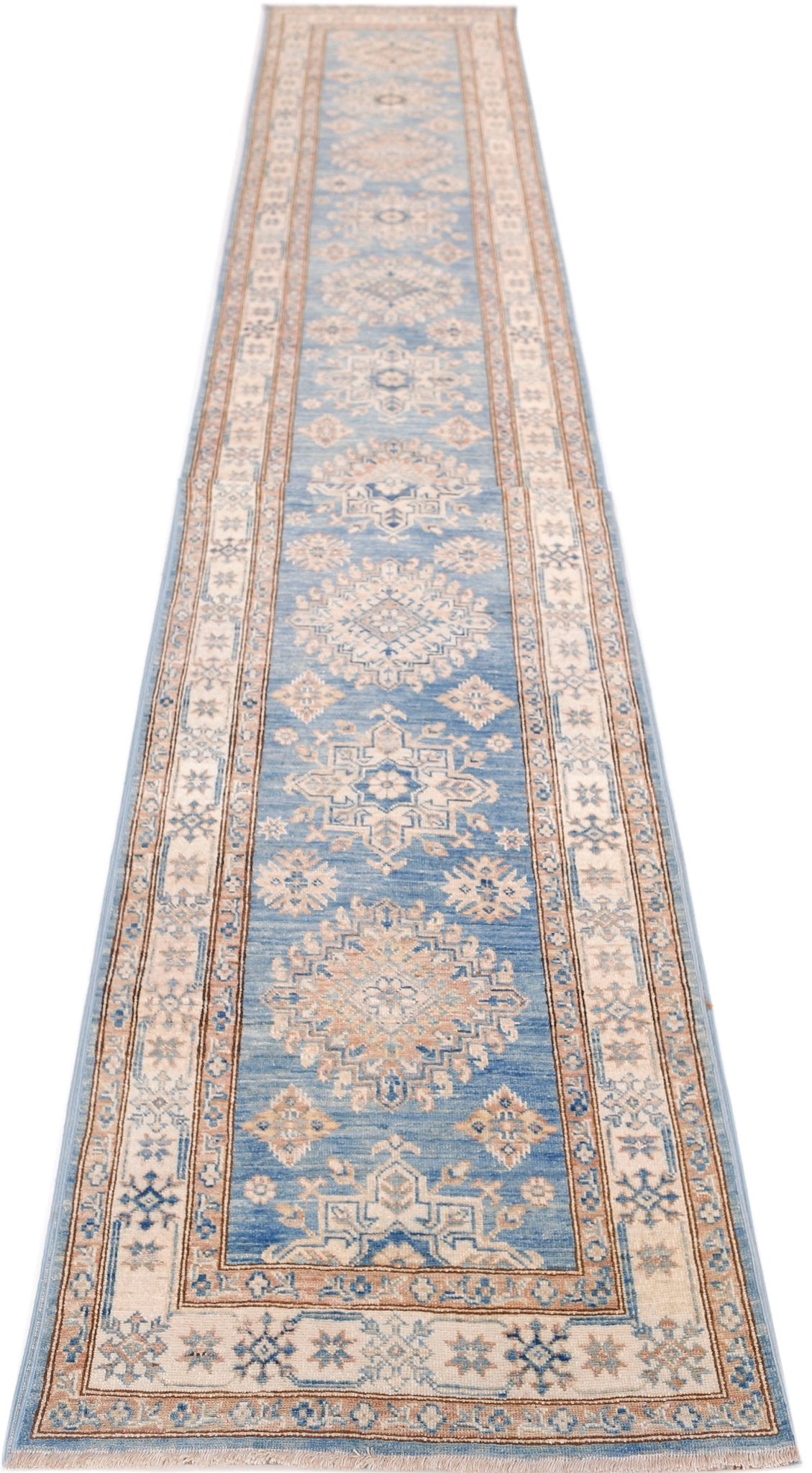 A long, handmade Afghan Super Kazakh runner rug featuring traditional blue and beige geometric motifs.