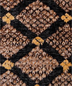 Handmade Afghan Yekta rug featuring a black cotton base with textured brown and yellow patterns.