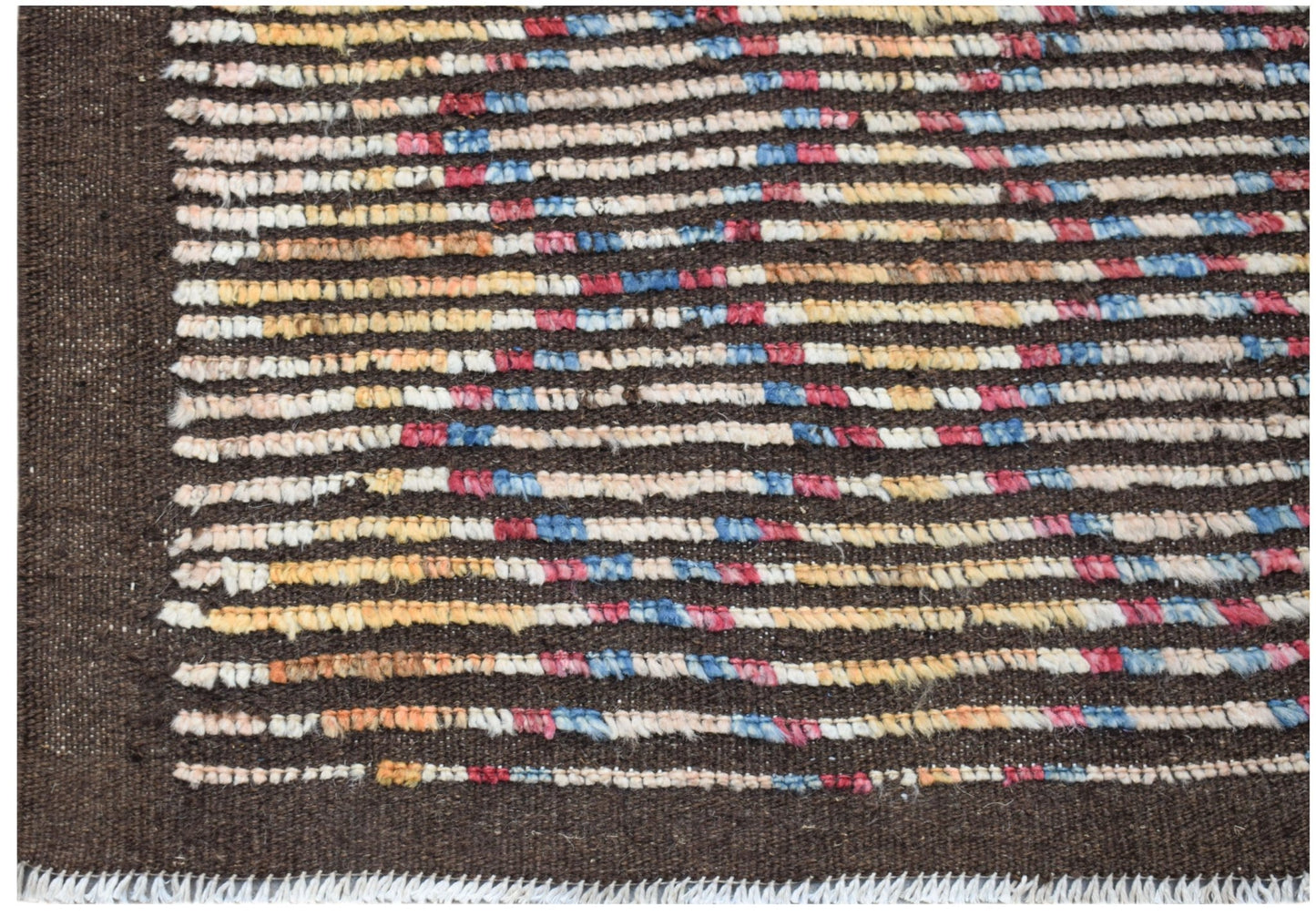 An Afghan Yekta rug featuring horizontal stripes of multicolored wool on a dark brown background.