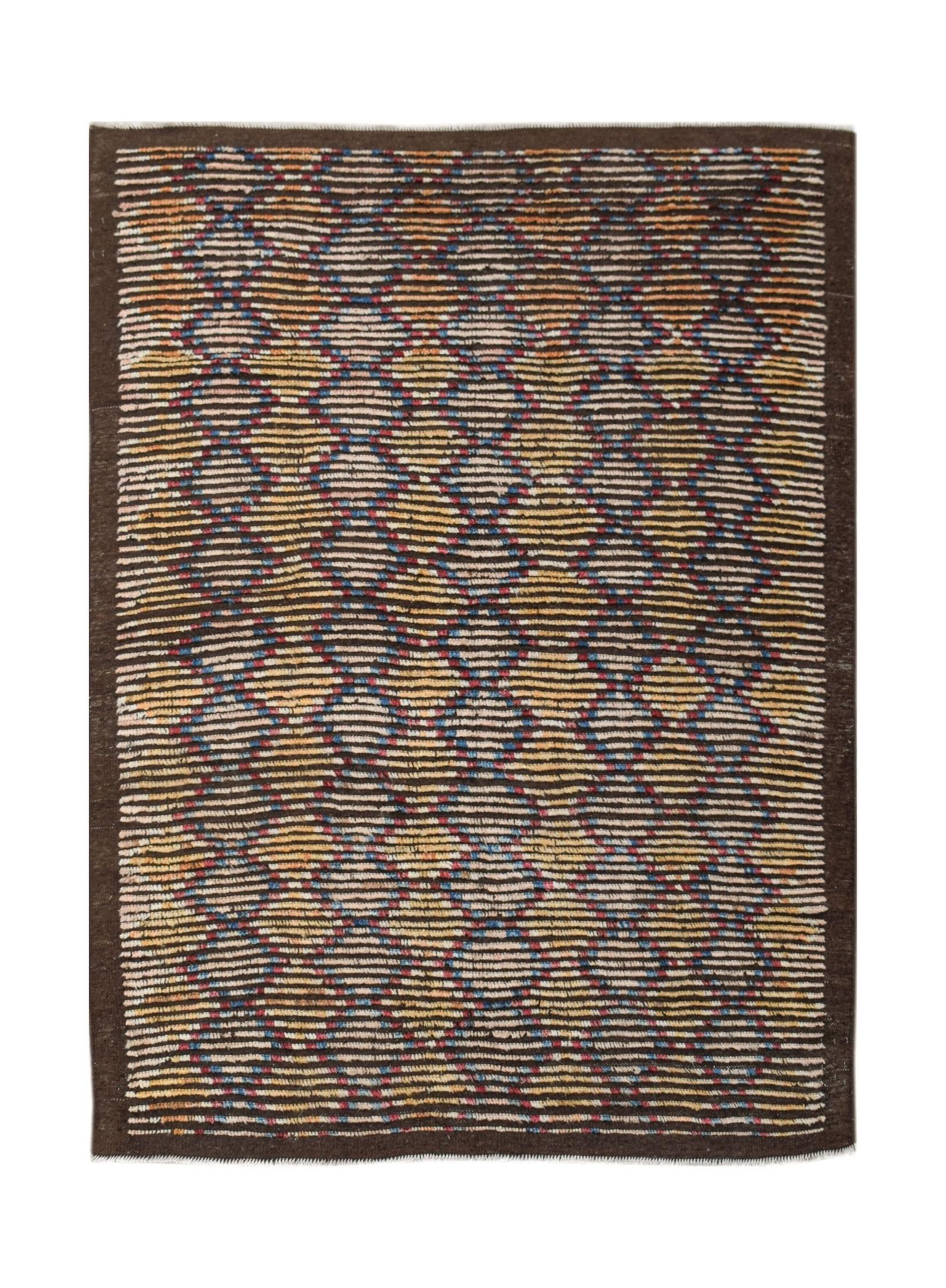 An Afghan Yekta rug featuring a geometric pattern of horizontal lines in earthy tones.