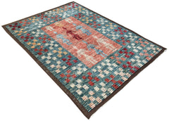An Afghan Yekta rug featuring a central pink panel with stylized figures on a blue checkered field.