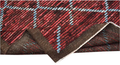 A hand-knotted Afghan Yekta rug featuring a red and blue geometric pattern on wool.