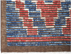 Hand-knotted Afghan rug featuring a geometric pattern of red, blue, and white wool on brown.