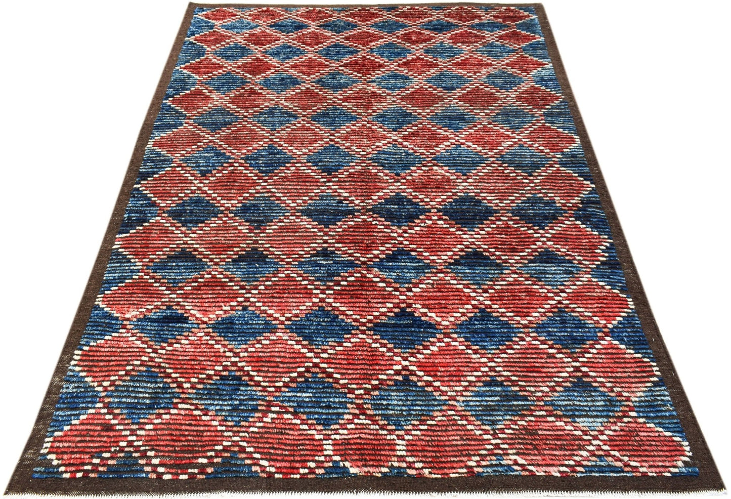 An Afghan Yekta rug featuring a repeating diamond pattern in shades of red and blue.