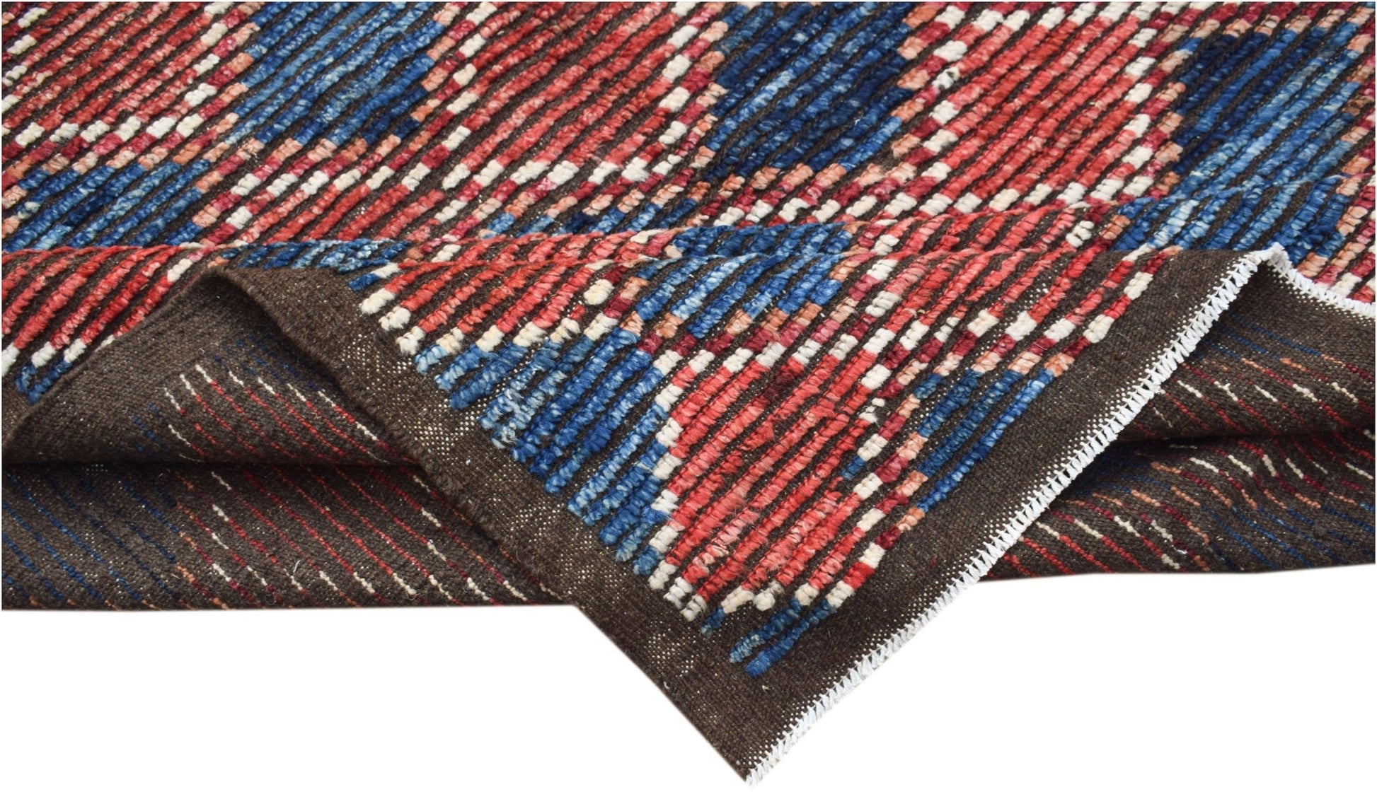 A hand-knotted Afghan rug featuring a geometric pattern in red, blue, and white on a brown base.