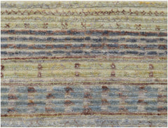 An Afghan Yekta rug featuring horizontal stripes in muted tones of yellow, blue, and brown.