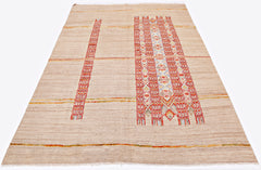 An Afghan Yekta rug featuring a beige field with red and blue geometric patterned stripes.