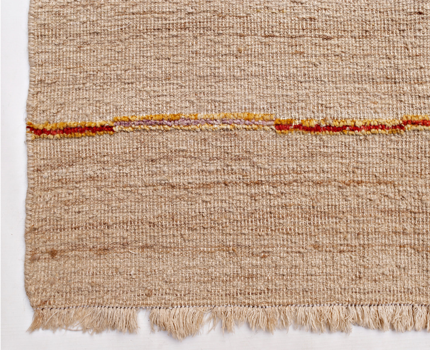 A handmade Afghan Yekta rug featuring a textured beige wool weave with a horizontal striped accent.