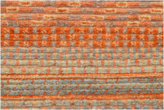 A handmade Afghan Yekta rug featuring a textured, horizontal striped pattern in orange and grey.