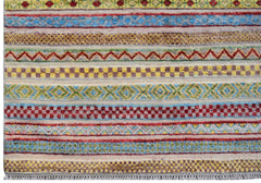 Handmade Afghan Yekta rug featuring a vibrant, multi-colored geometric striped pattern.