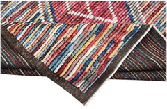 A hand-knotted Afghan Yekta rug featuring a colorful, striped geometric pattern in wool.