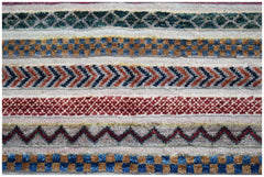 Handmade Afghan Yekta rug featuring horizontal bands of geometric patterns in wool.