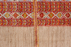 A handmade Afghan Yekta rug featuring a textured combination of flatweave and pile sections.