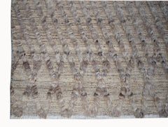 Handmade Afghan Yekta rug featuring a textured diamond pattern in neutral wool tones.