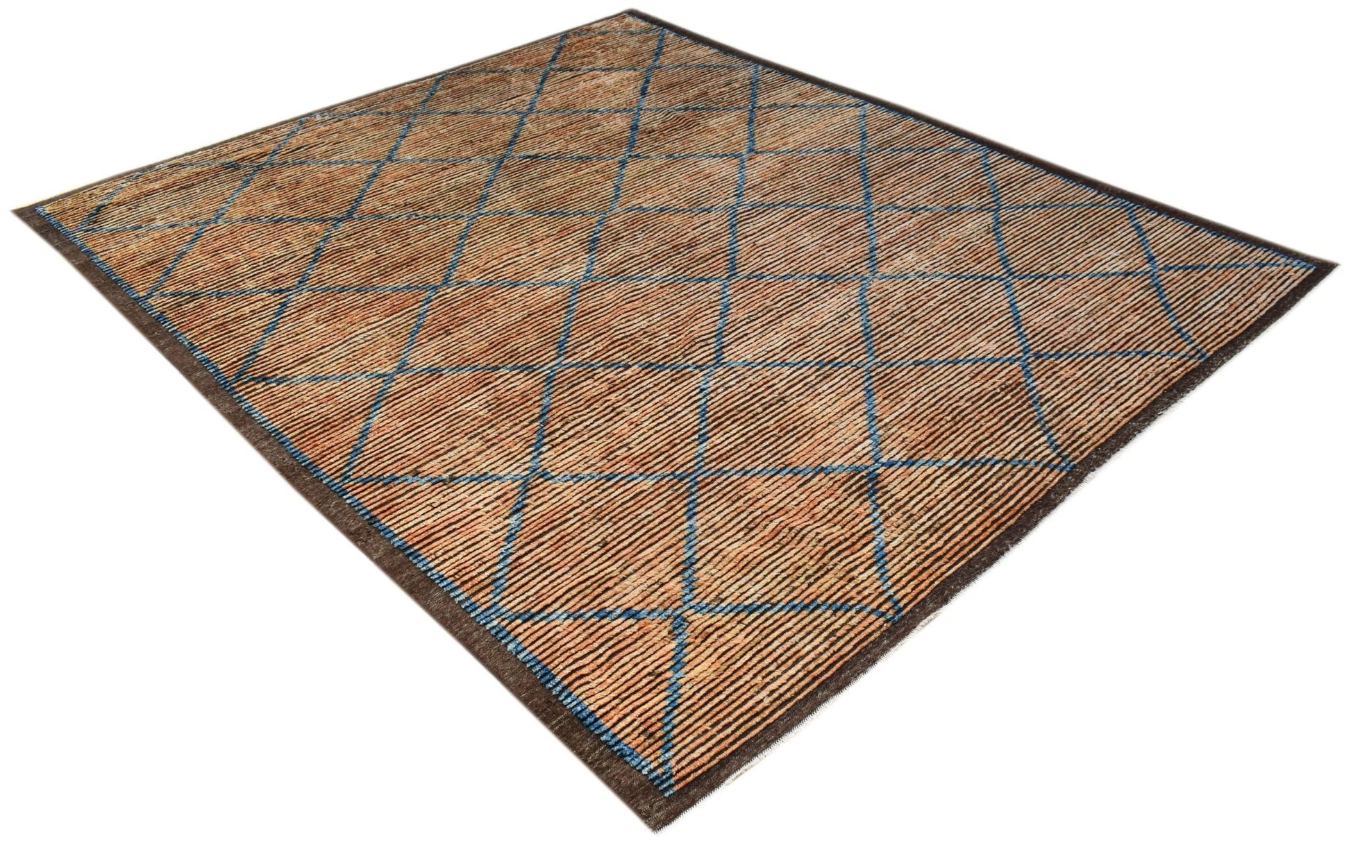 An Afghan Yekta rug featuring a brown and tan striped pattern with blue geometric diamond accents.