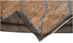 An Afghan Yekta rug featuring a striped pattern in orange, brown, and blue hand-spun wool.