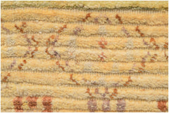A close-up of an Afghan Yekta rug featuring textured horizontal bands in shades of yellow and brown.