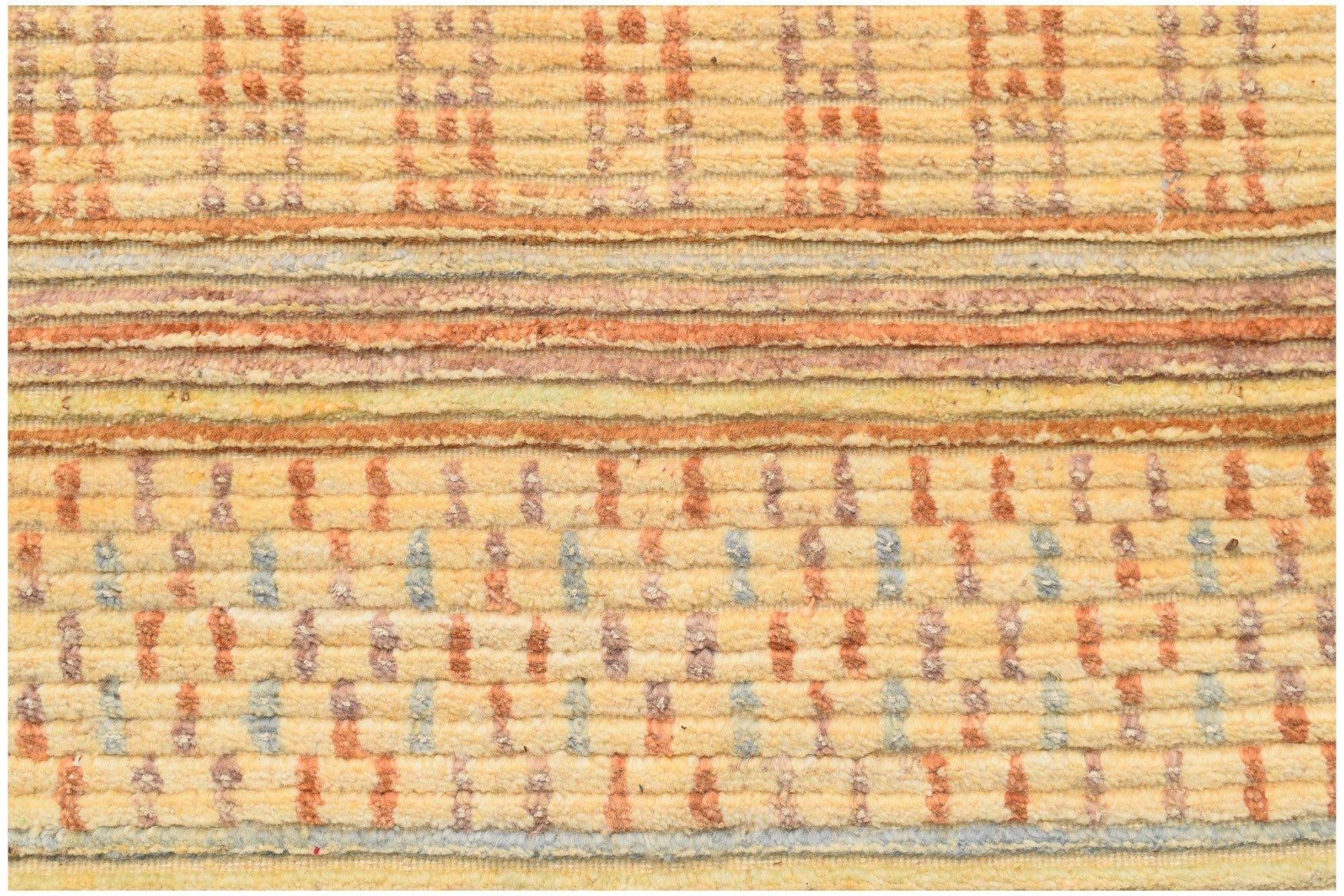 A handmade Afghan Yekta rug featuring a textured, striped pattern in shades of yellow and orange.