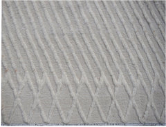 Handmade Afghan Yekta rug featuring a textured, cream-colored diamond pattern on a woven base.