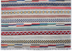 An Afghan Yekta runner rug featuring horizontal bands of geometric patterns in vibrant colors.