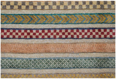 A handmade Afghan runner featuring horizontal bands of geometric patterns in varied colors.