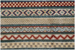 Handmade Afghan runner rug featuring horizontal bands of geometric patterns in wool.